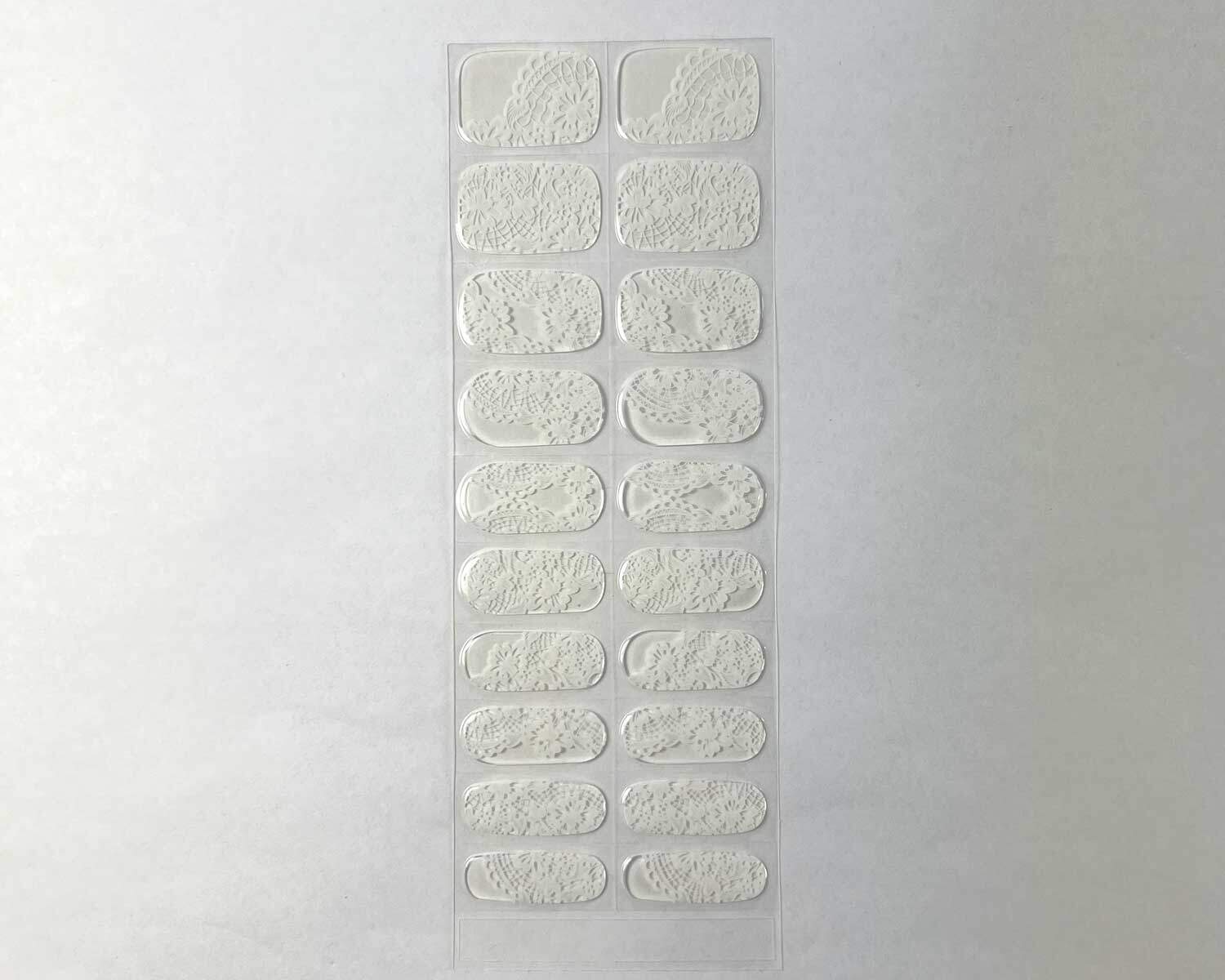 Bridal lace white transparent semi-cured gel nails strip showing 20 pieces with 10 different sizes on white background
