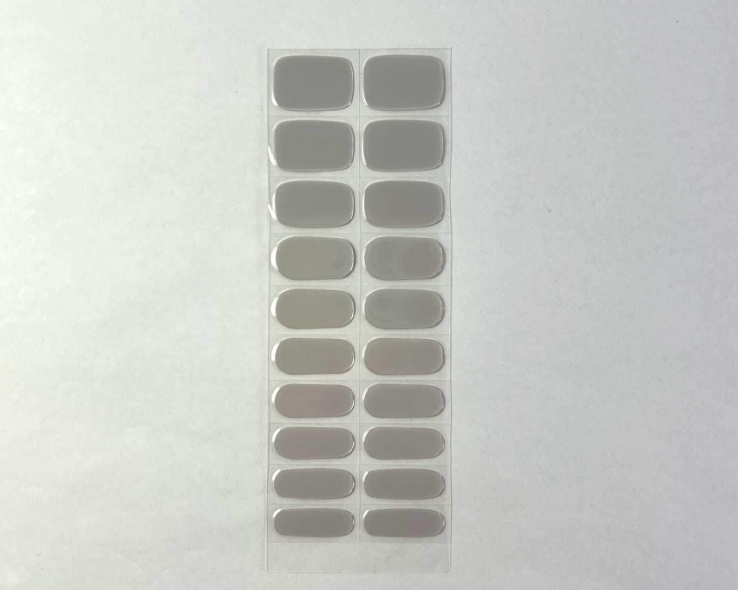 Grey diamond silver semi-cured gel nails strip showing 20 pieces with 10 different sizes on white background
