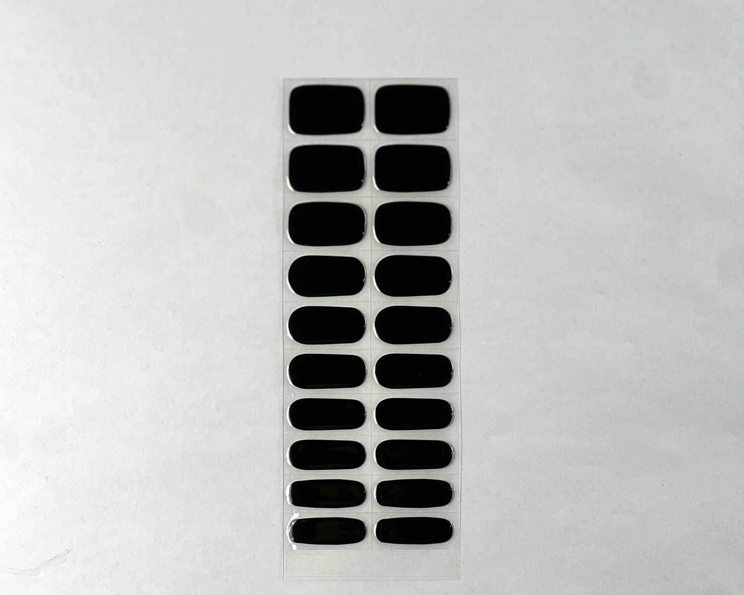 night-black-semi-cured-nails-strip Night black semi-cured gel nails strip showing 20 pieces with 10 different sizes on white background
