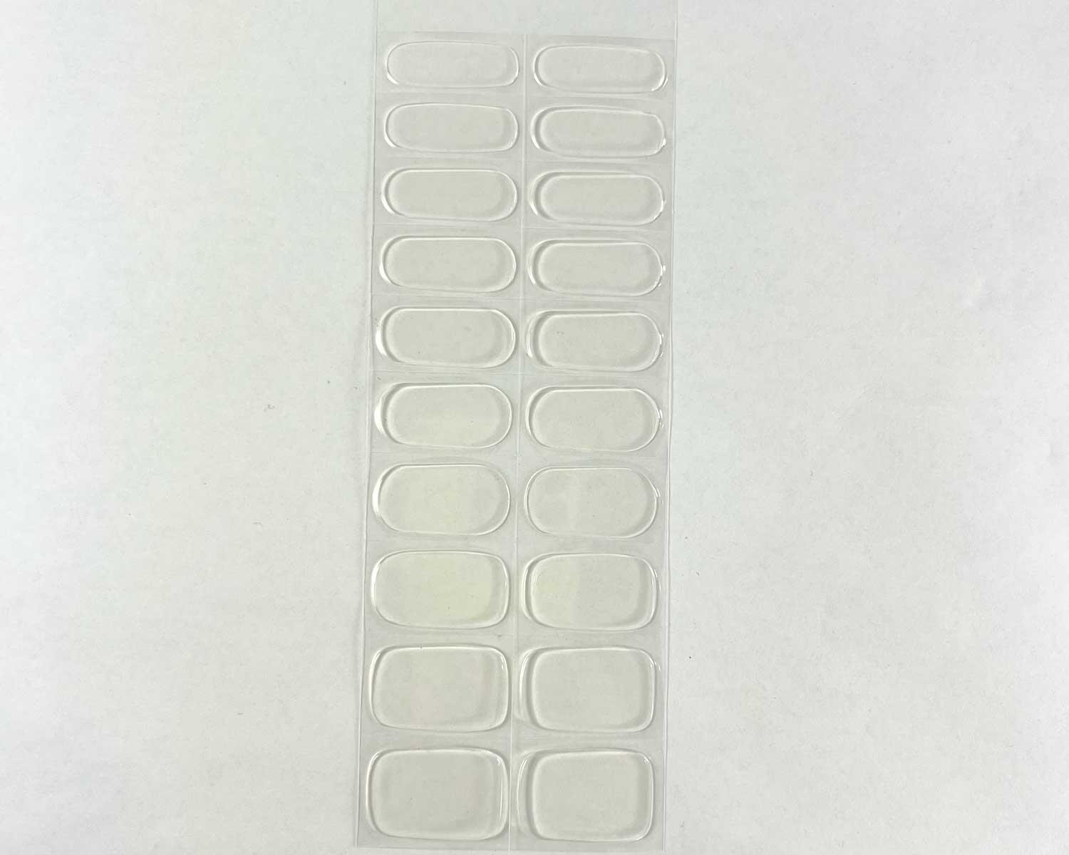 transparent-semi-cured-nails-strip Transparent clear semi-cured gel nails strip showing 20 pieces with 10 different sizes on white background