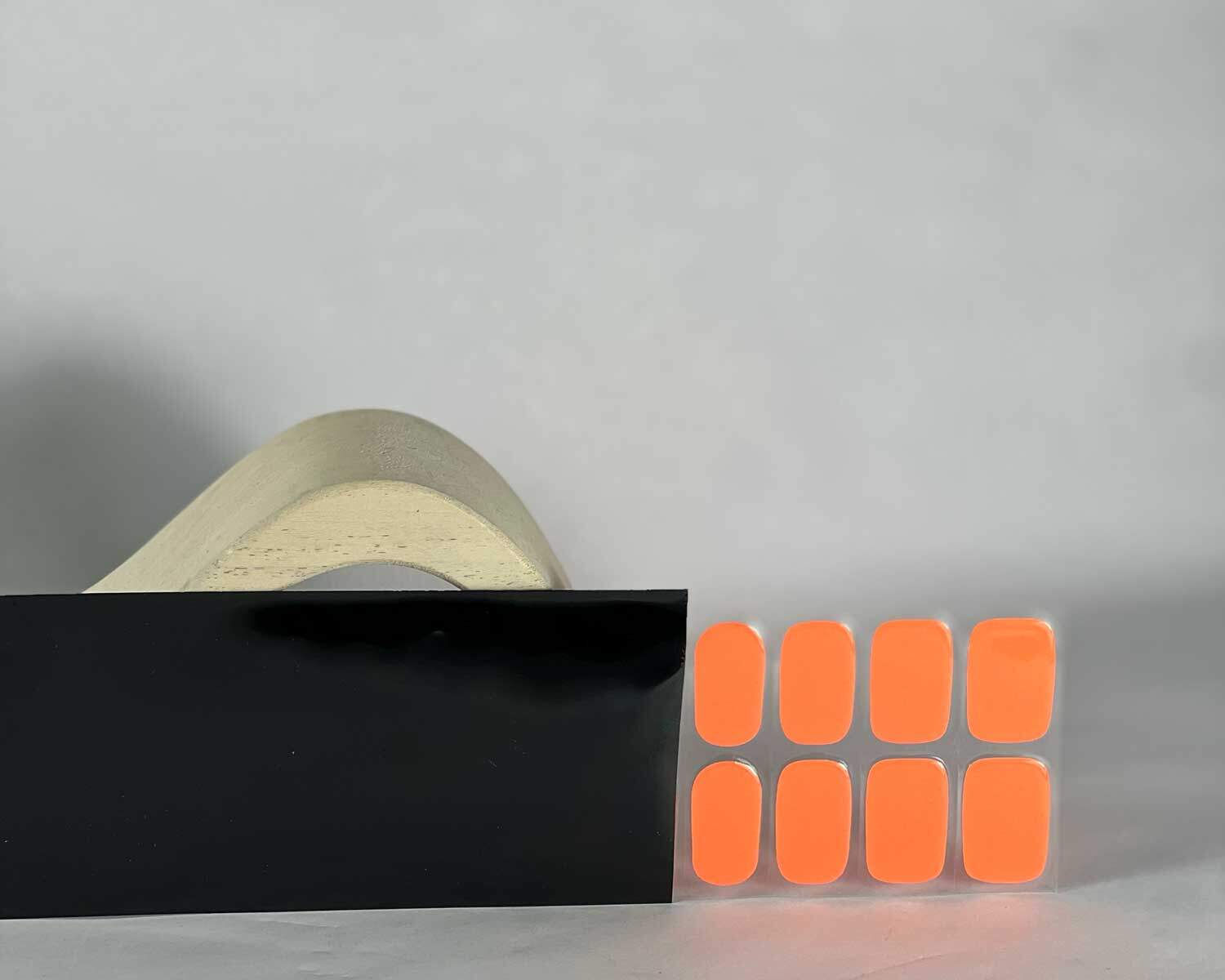 Neon Orange Glow in the dark semi-cured gel nails in black light sensitive strip
