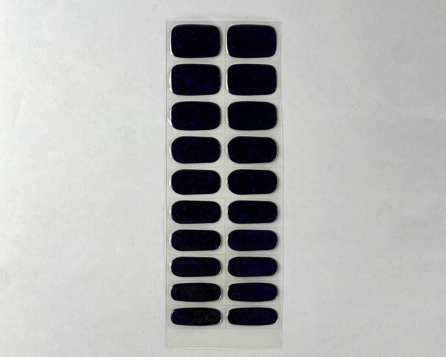Violet Luster black and purple semi-cured gel nails strip showing 20 pieces with 10 different sizes on white background