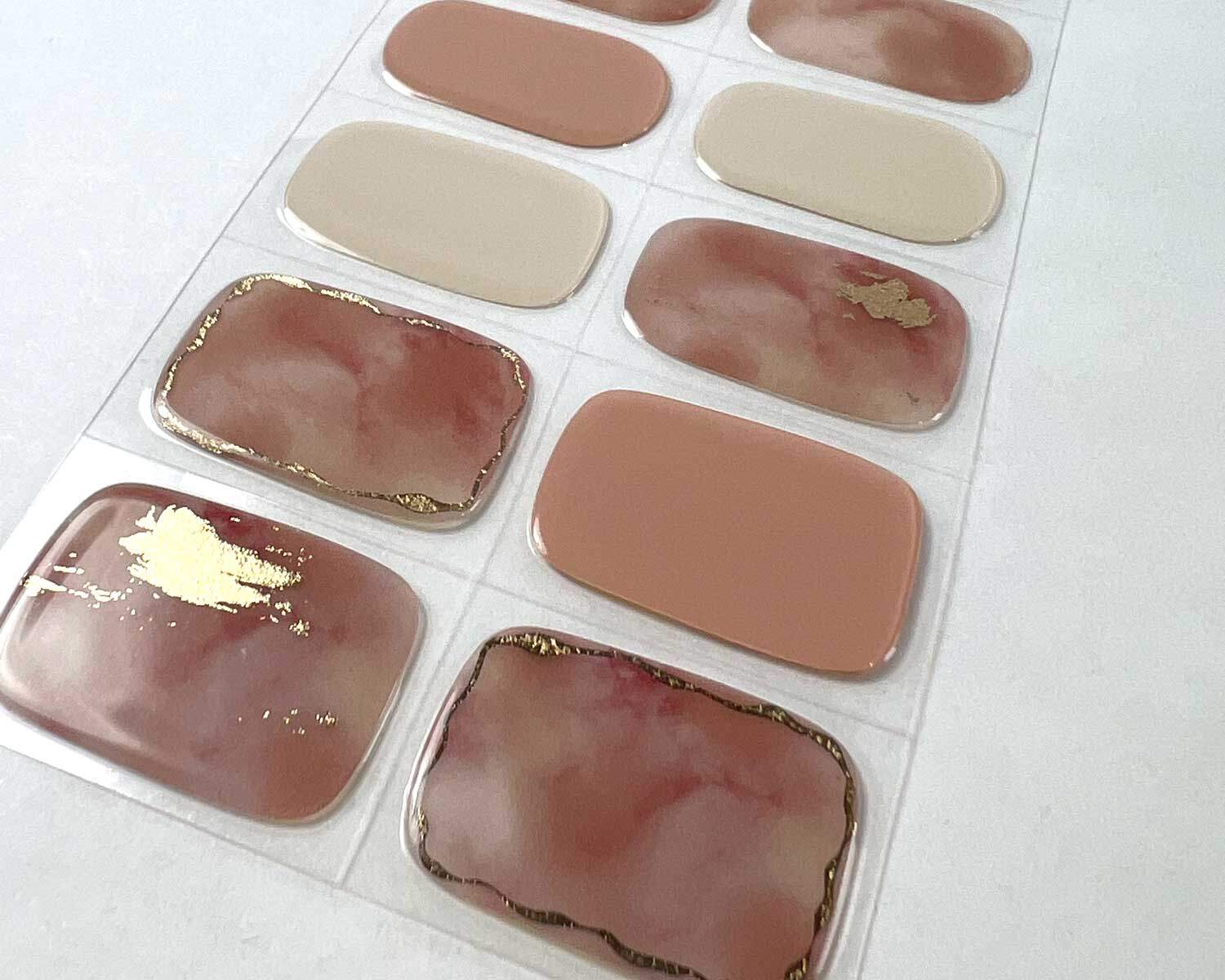 Gold Digger semi-cured gel nails on angle zoomed in on white background