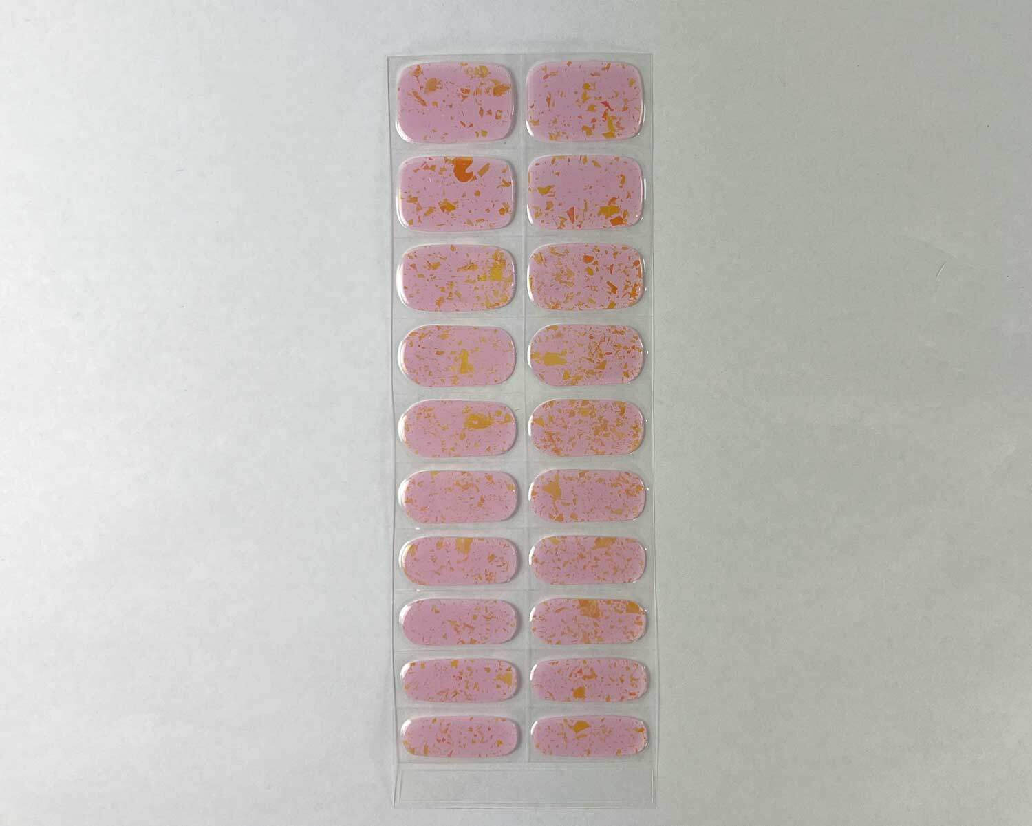 Pink Speckle Orange semi-cured gel nails strip showing 20 pieces with 10 different sizes on white background