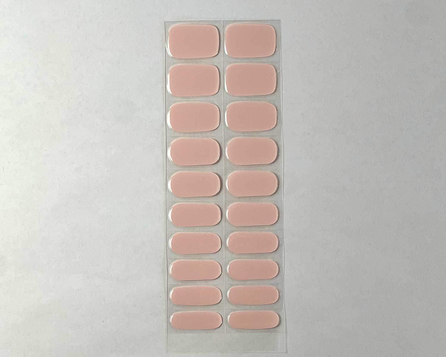 Strawberry Milkshake pink semi-cured gel nails strip showing 20 pieces with 10 different sizes on white background