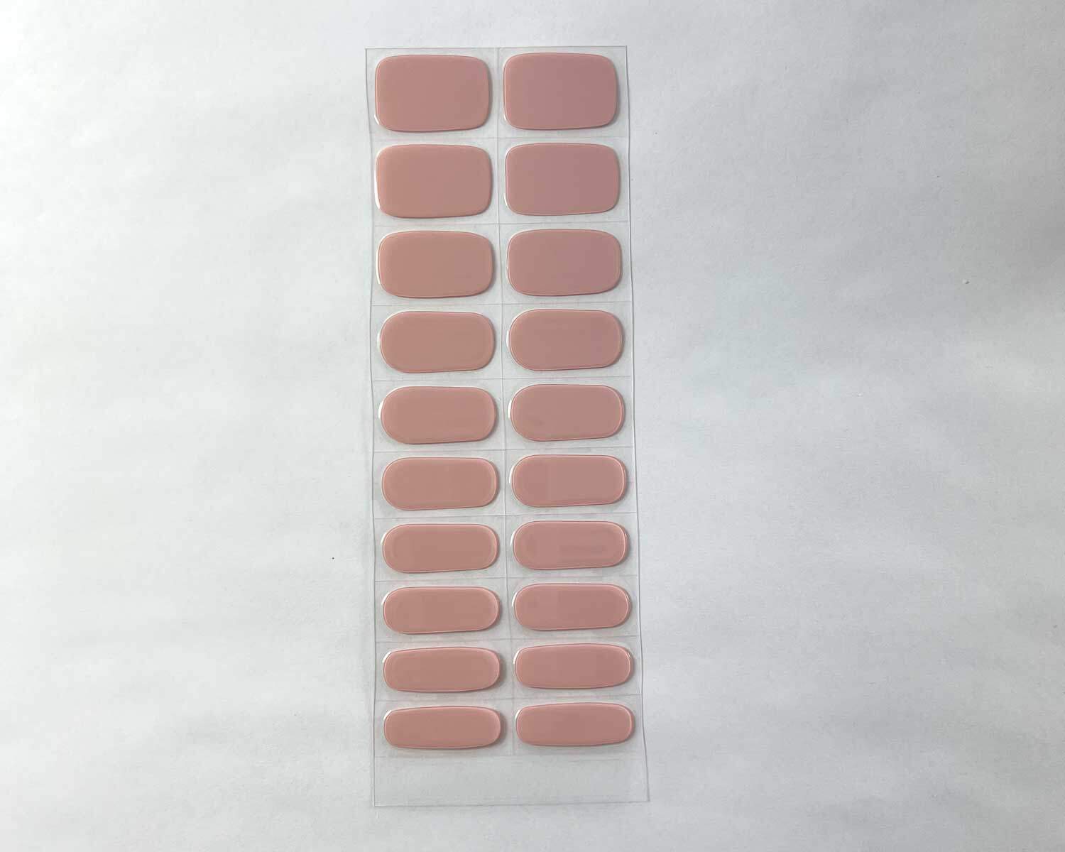 semi-cured-Gel-Nail-Sticker-pink-marshmellow-strip pink marshmallow semi-cured gel nails strip showing 20 pieces with 10 different sizes on white background