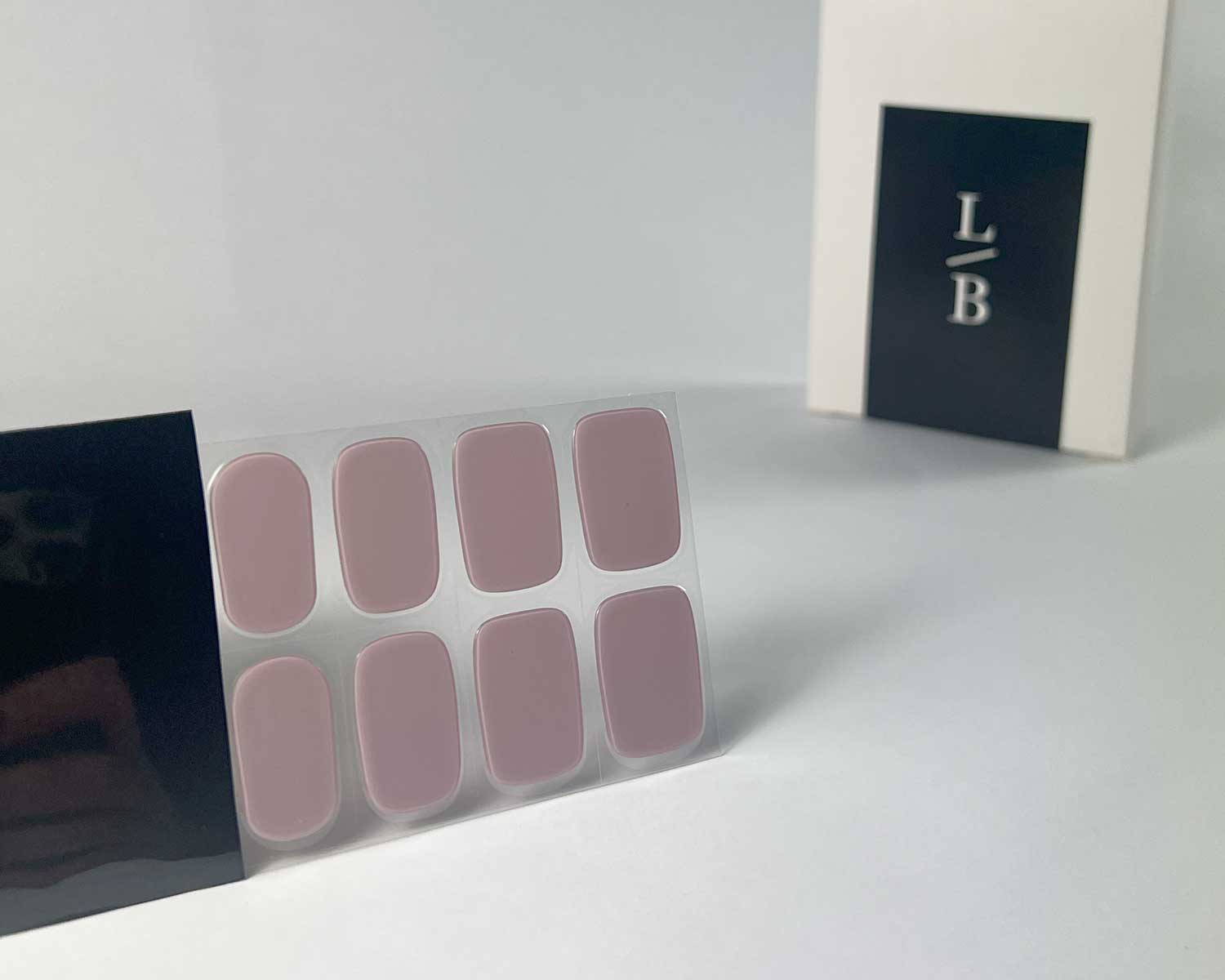 dusty-mauve-semi-cured-gel-nail-black-strip-angle