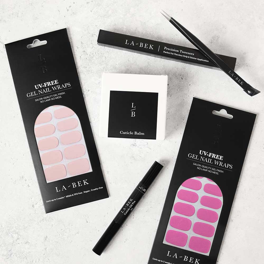 Pink Glow Essentials Starter Kit with UV-free gel wraps, lamp, tweezers, cuticle balm and oil pen