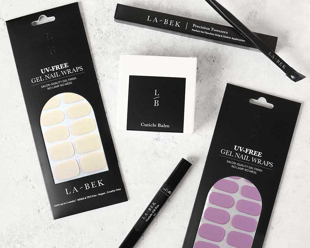 Soft Kiss Essentials Starter Kit with UV-free gel wraps, lamp, tweezers, cuticle balm and oil pen