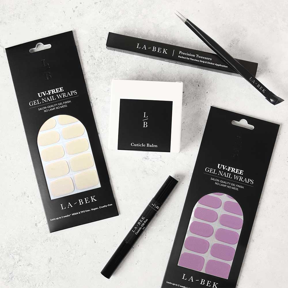 Soft Kiss Essentials Starter Kit with UV-free gel wraps, lamp, tweezers, cuticle balm and oil pen