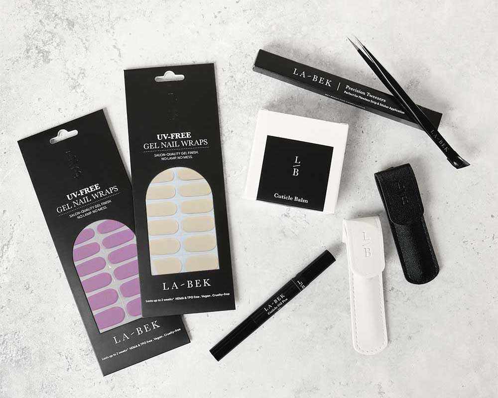 Soft Kiss Premium Starter Kit with UV-free gel wraps, lamp, tweezers and tools