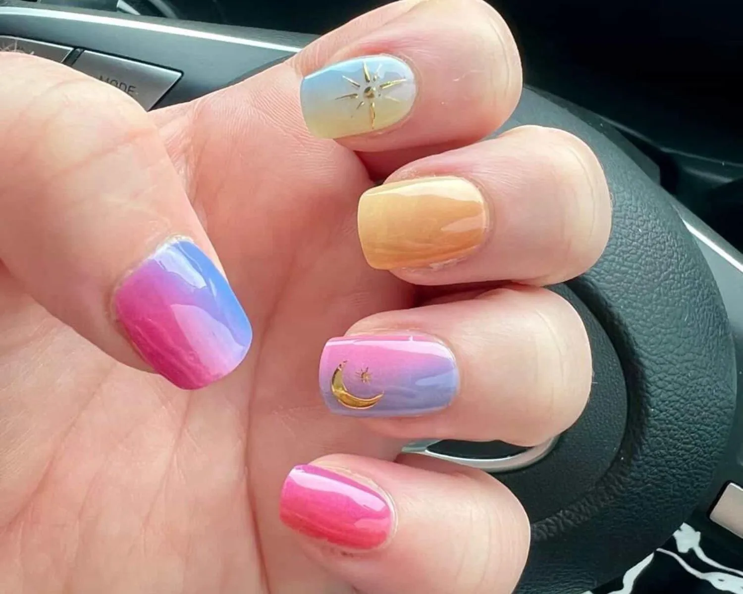 Rainbow Sunset semi-cured gel nails with nail art decals moon and sun