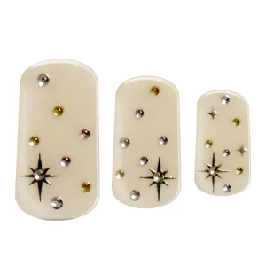 Cream Goddess UV-Free gel nail wrap by La-Bek — cream base with scattered gold and silver gems and star accents